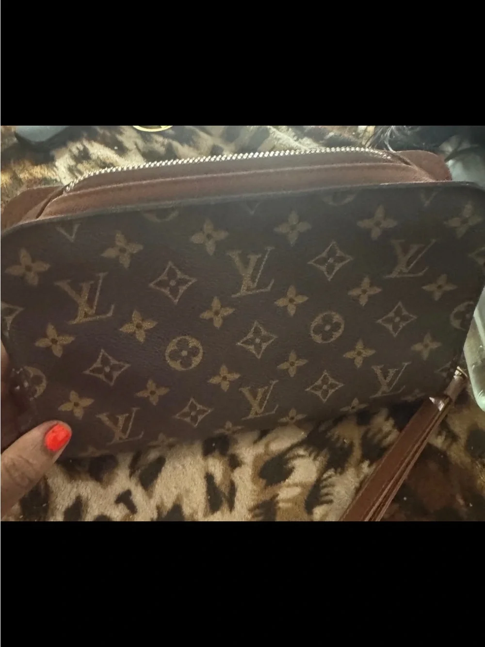Louis Vuitton Orsay Monogram Wristlet